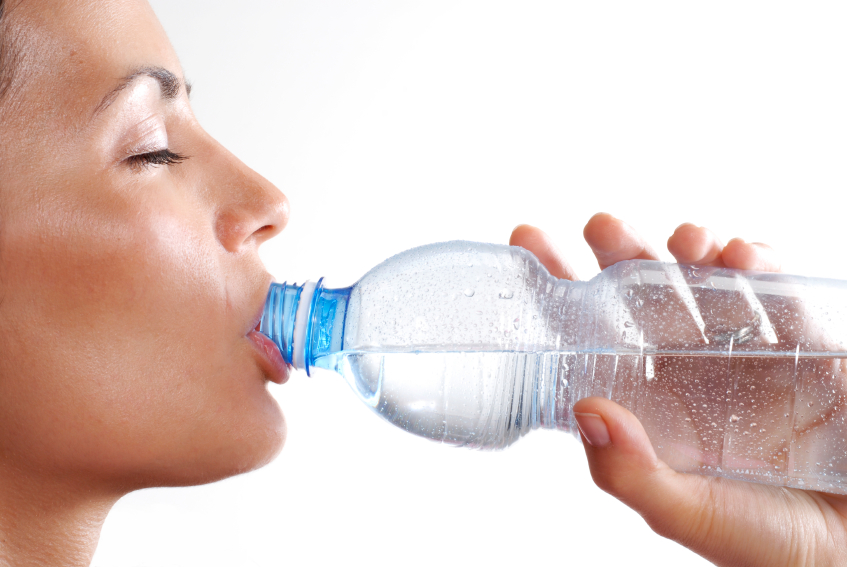 woman drinking from bottle iStock_000021172653_Small