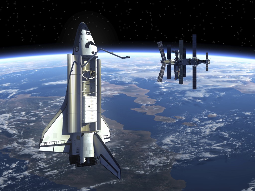a space shuttle and the international space station with the earth in the background