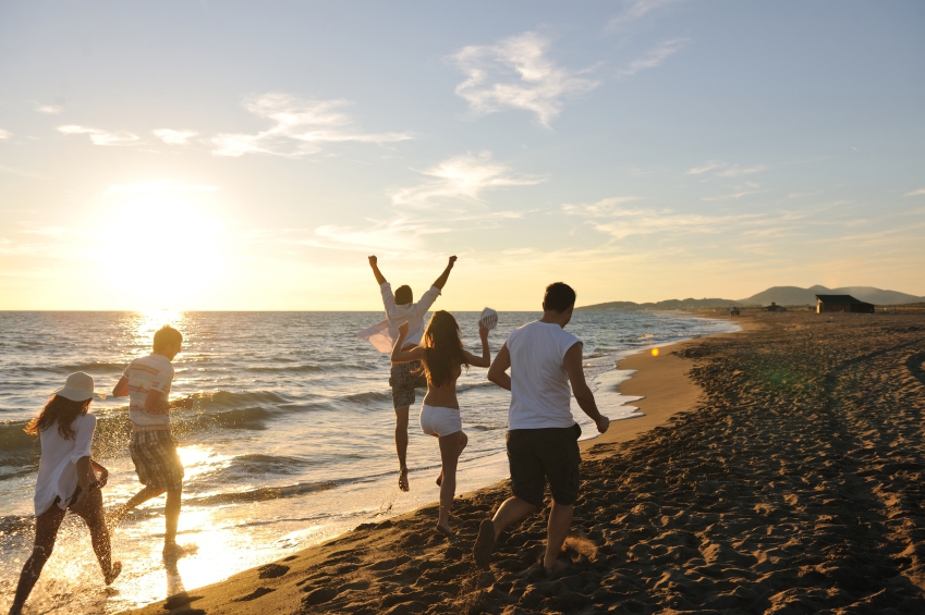 Group running on beach