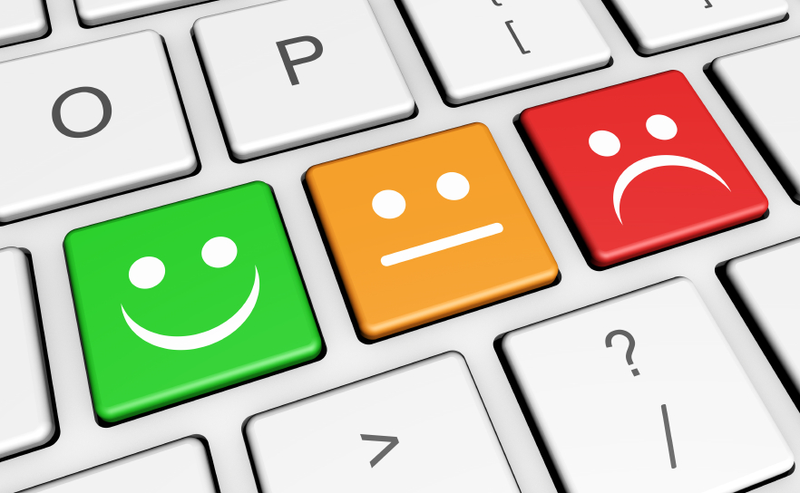 customer wuality survey image showing happy, neutral and sad face keyboard type buttons