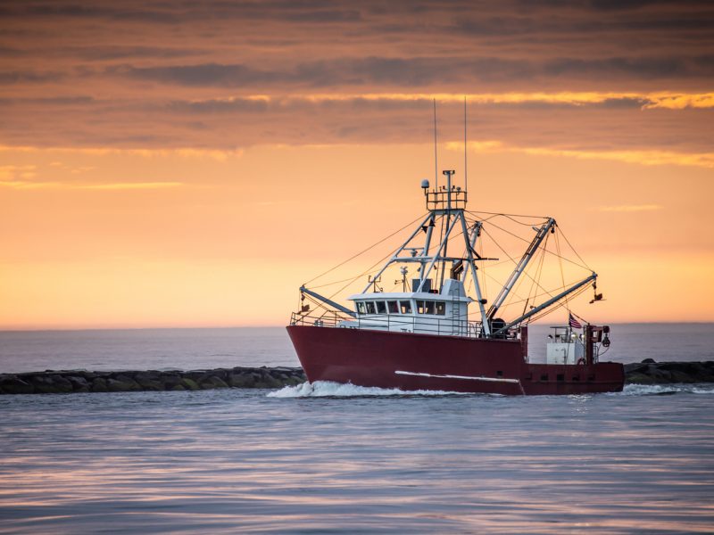 Fishing boat returns to port after a long night - at Barnegat Inlet