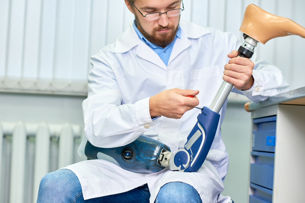 Doctor Assembling Prosthetic Leg